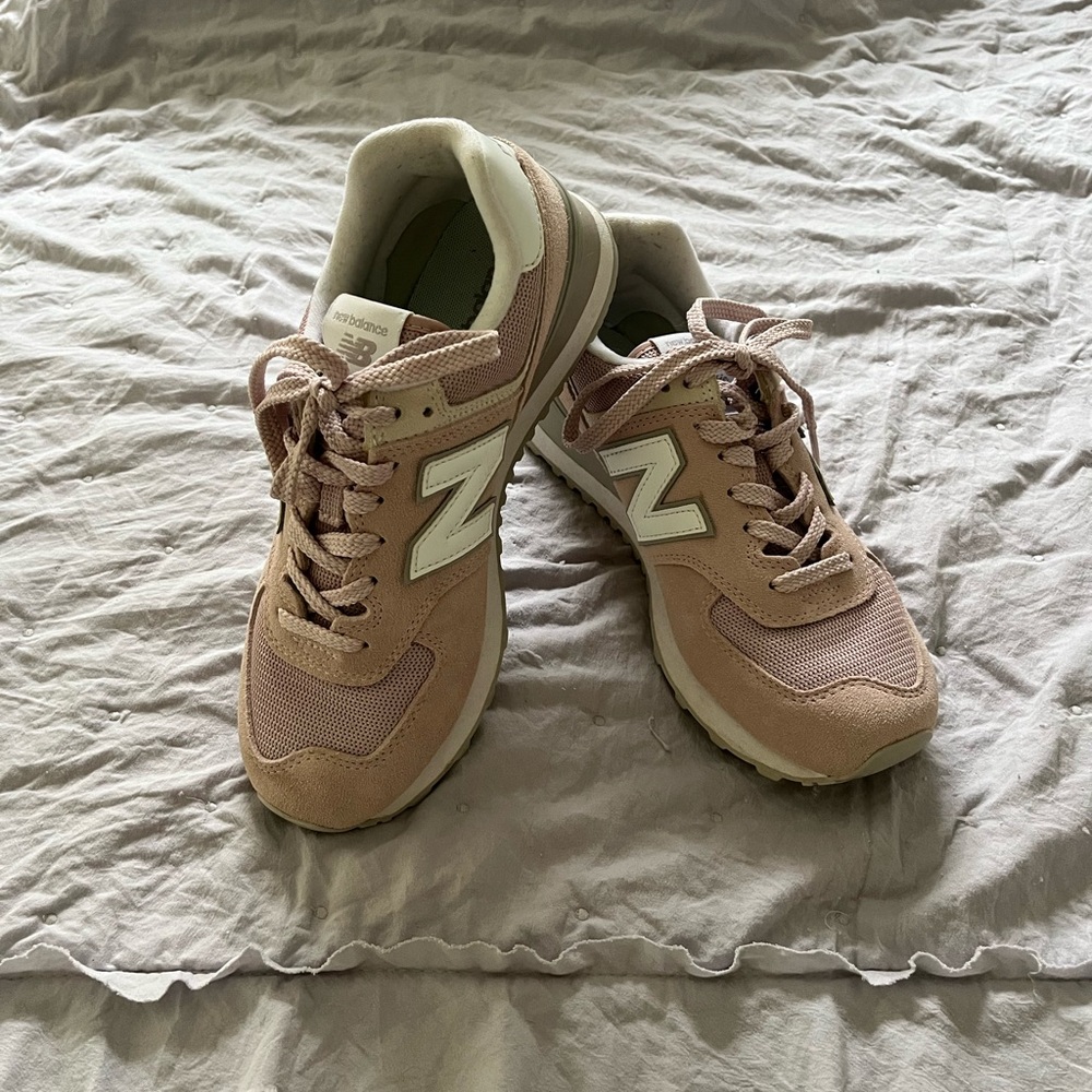 Pink suede New Balance sneakers